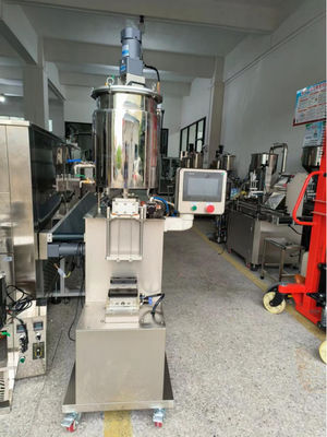 Machine de remplissage à double tête de mascara et de glossaire à lèvres